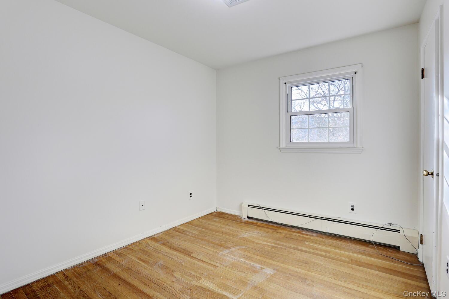 12 Van Gogh Lane Airmont, NY 10901 - Photo 12 of 21 an empty room with a window