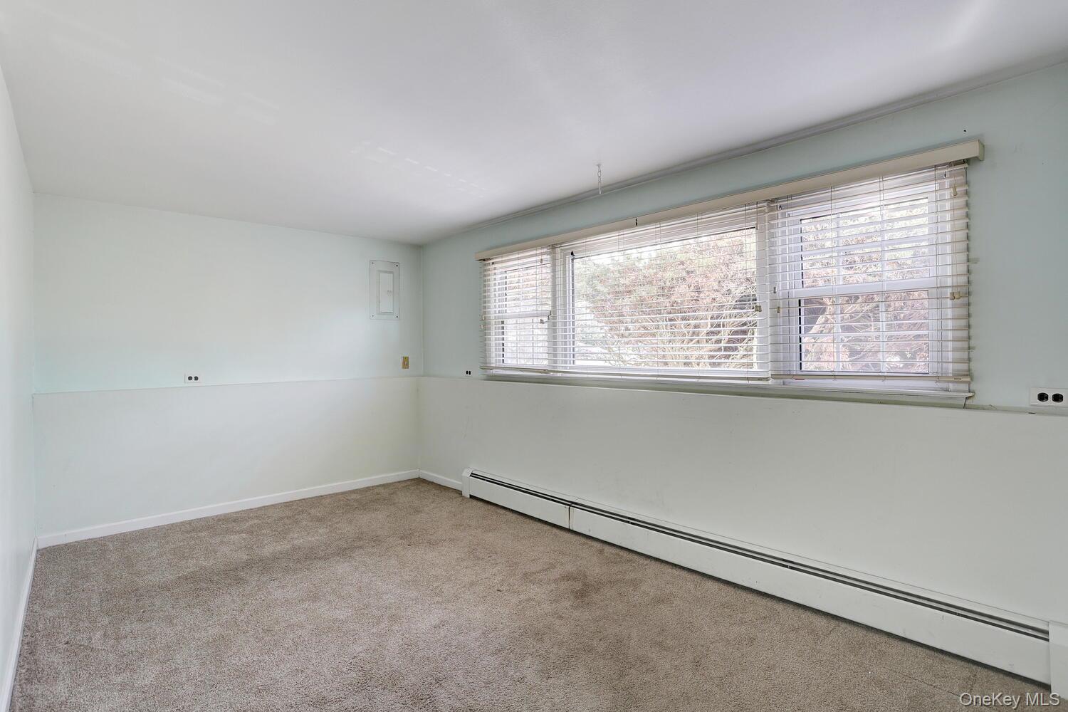 12 Van Gogh Lane Airmont, NY 10901 - Photo 14 of 21 an empty room with a window