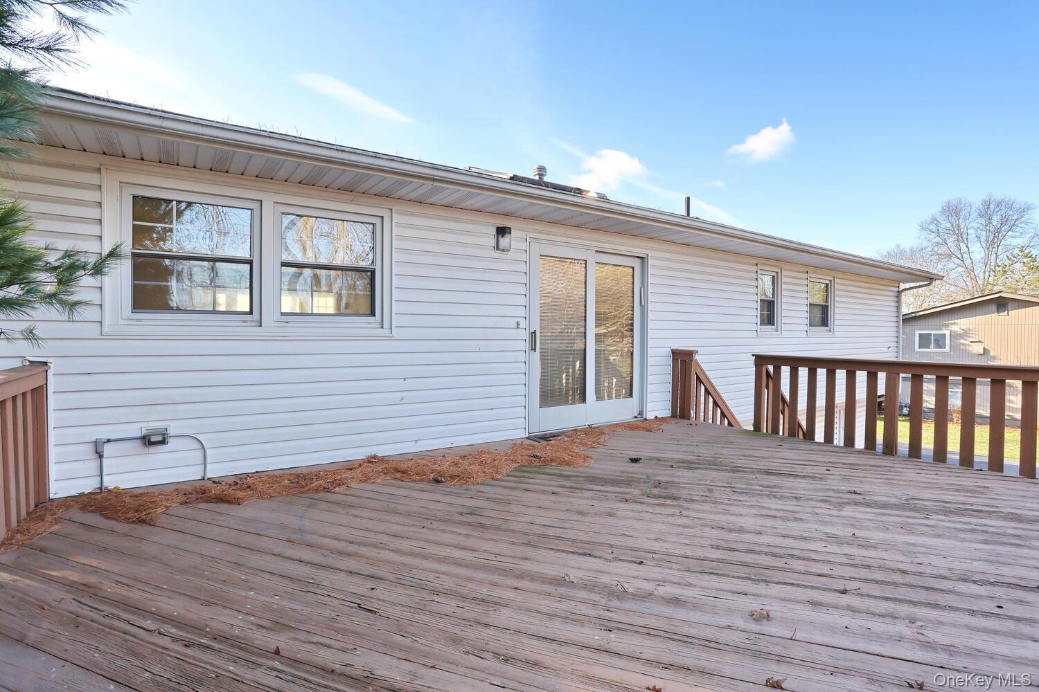12 Van Gogh Lane Airmont, NY 10901 - Photo 20 of 21 a view of a house with wooden deck