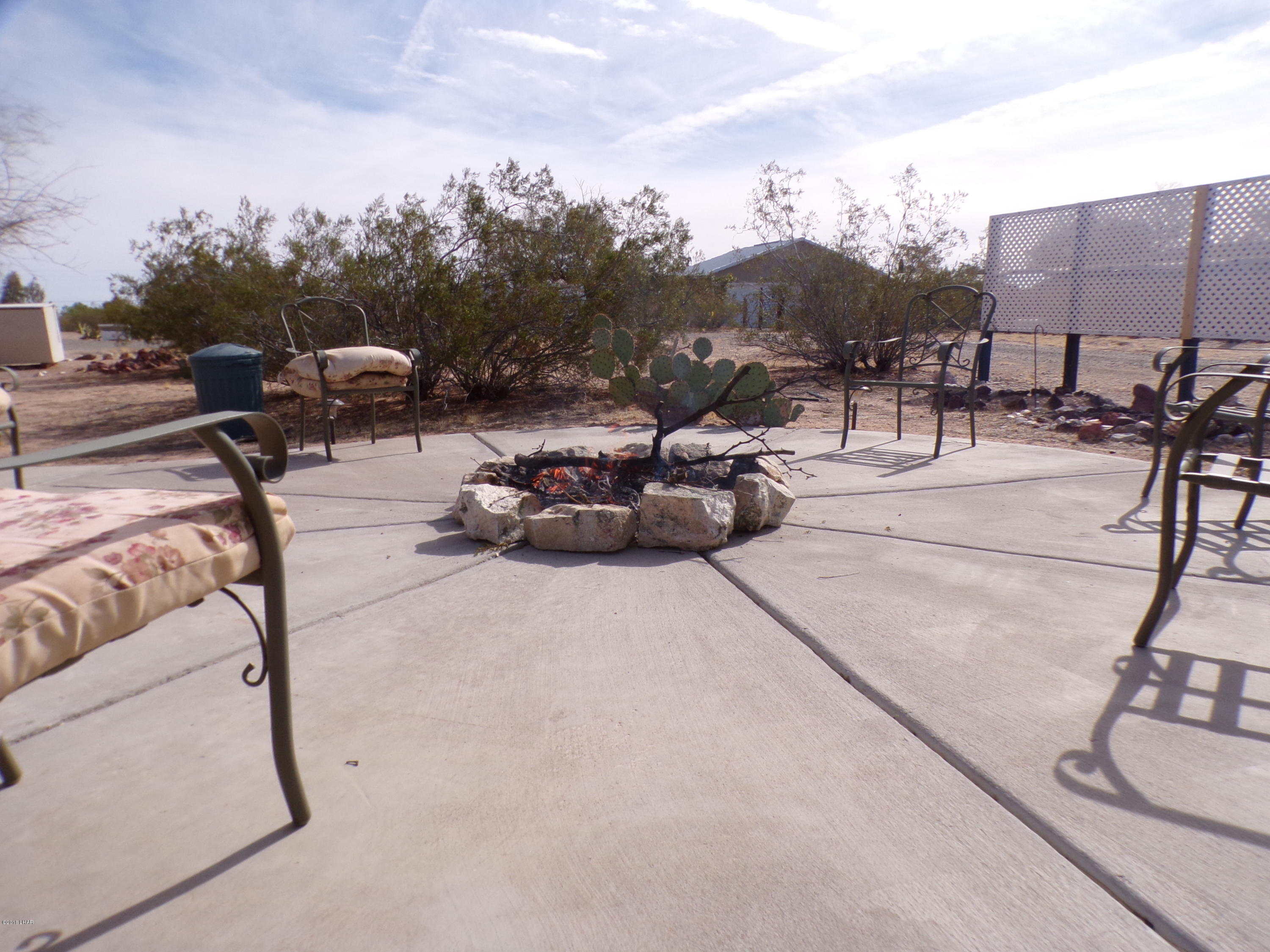 25533 Ochoco Way Bouse, AZ 85325 - Photo 26 of 27 Gathering area. Fire ring