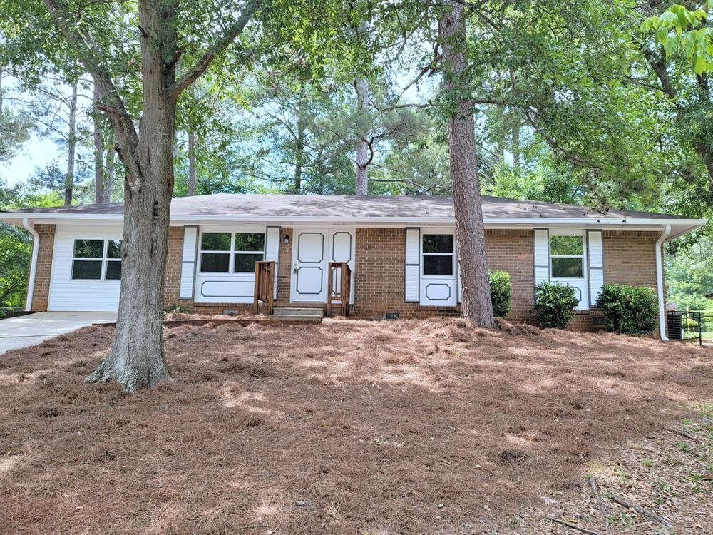 10085 Brass Ring Road Jonesboro, GA 30238 - Photo 1 of 1 front view of a house with a tree in front of it