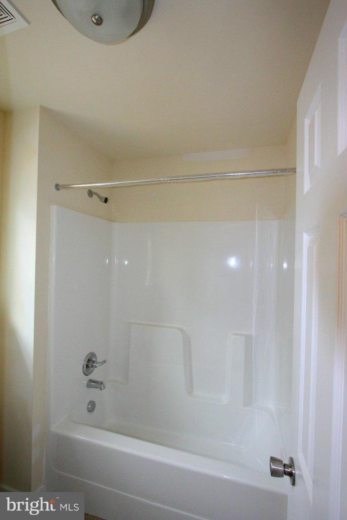 7 Winding Ridge Way Bumpass, VA 23024 - Photo 16 of 21 a bathroom with a shower and a bathtub