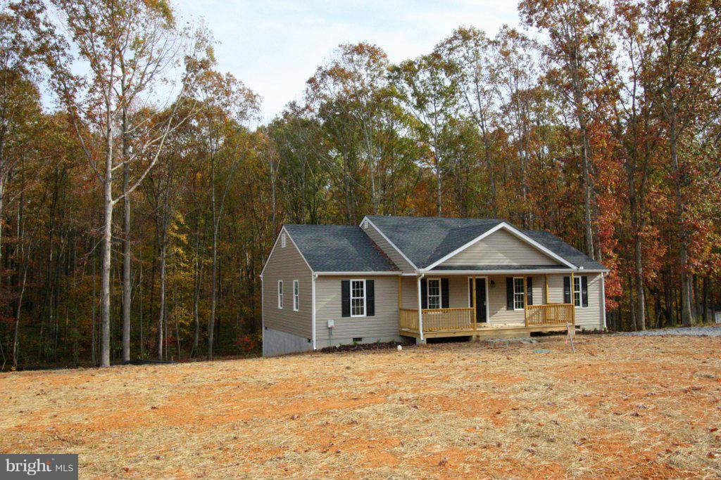 7 Winding Ridge Way Bumpass, VA 23024 - Photo 2 of 21 a front view of a house with a yard