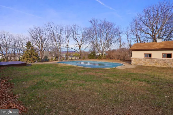 a view of backyard with green space