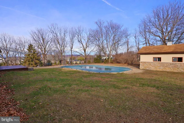 a view of backyard with green space