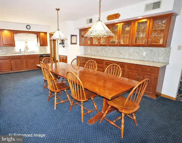 a group of chairs sitting in front of a building