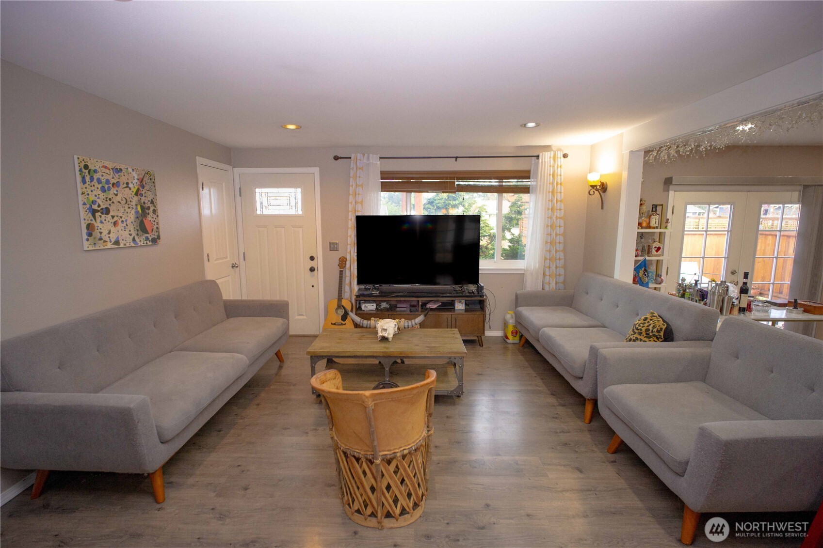 151 Valley View Drive Sequim, WA 98382 - Photo 8 of 40 a living room with furniture and a flat screen tv