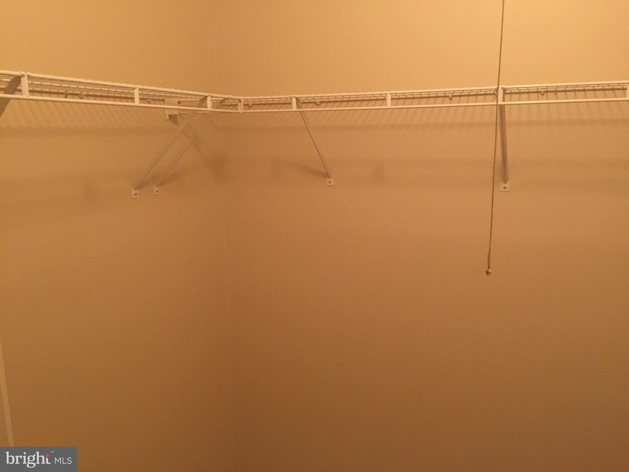 3107 Naylor Road Southeast, Unit 204 Washington, DC 20020 - Photo 14 of 17 a view of a room with racks on the wall