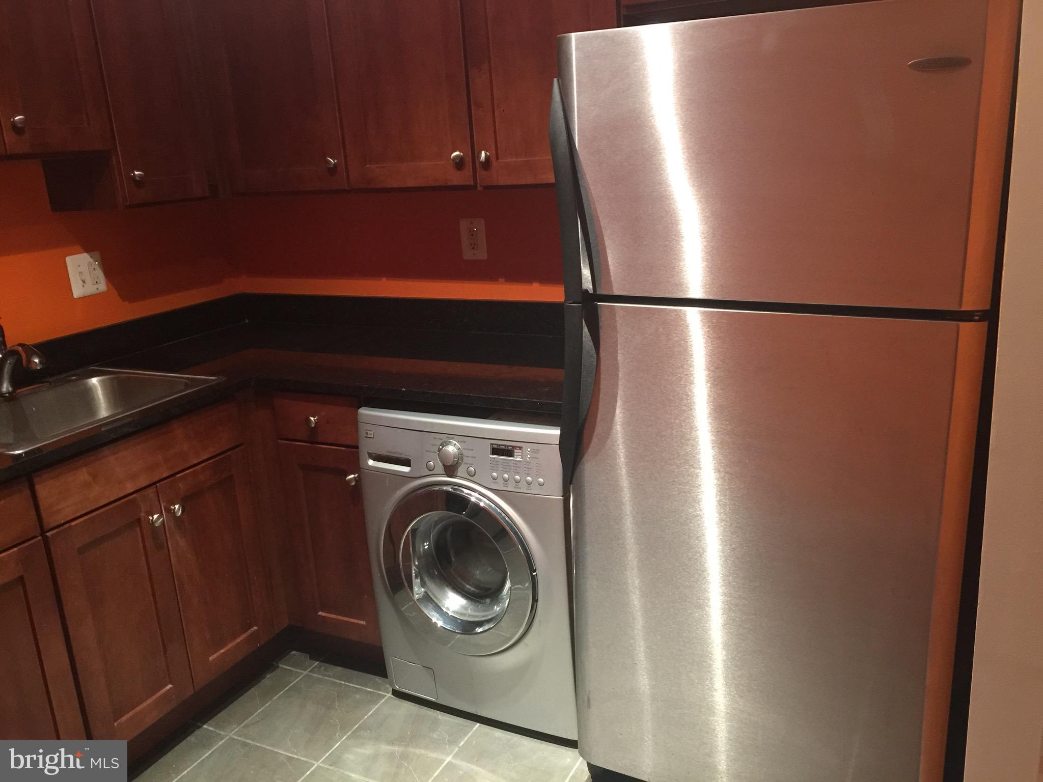 3107 Naylor Road Southeast, Unit 204 Washington, DC 20020 - Photo 8 of 17 a utility room with dryer and washer