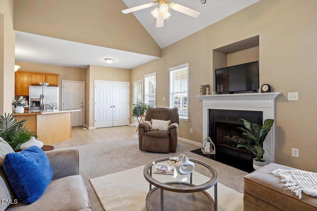 119 Victory Circle Willow Spring, NC 27592 - Photo 16 of 33 a living room with furniture and a fireplace