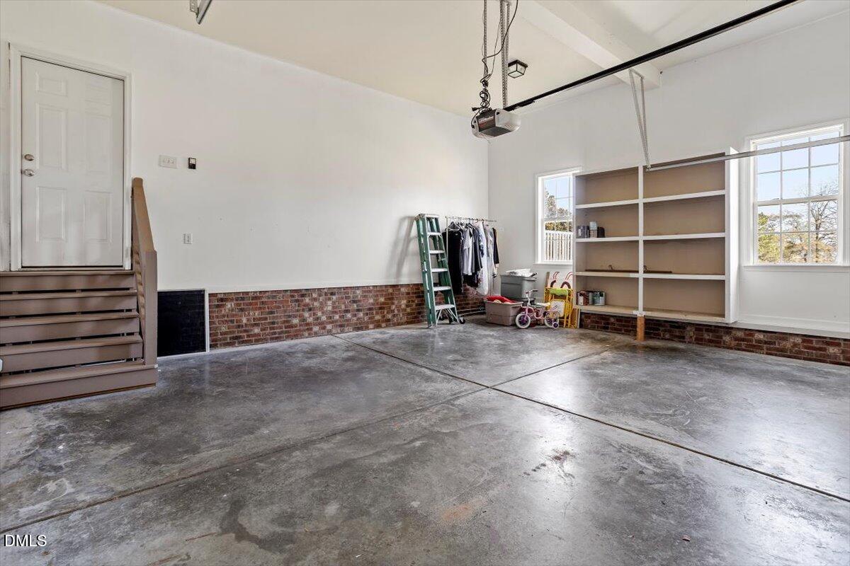 119 Victory Circle Willow Spring, NC 27592 - Photo 29 of 33 a view of a room with gym equipment and a window