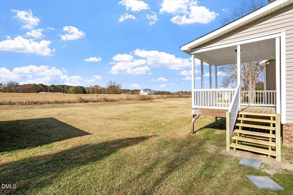 119 Victory Circle Willow Spring, NC 27592 - Photo 30 of 33 a view of a house with a ocean view