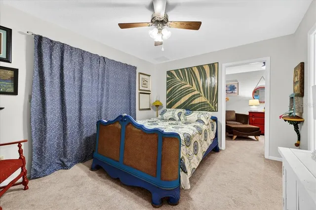 a bed room with a bed and a tv