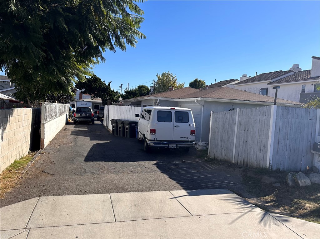 2344 Elden Avenue Costa Mesa, CA 92627 - Photo 2 of 6 a front view of a house with a yard