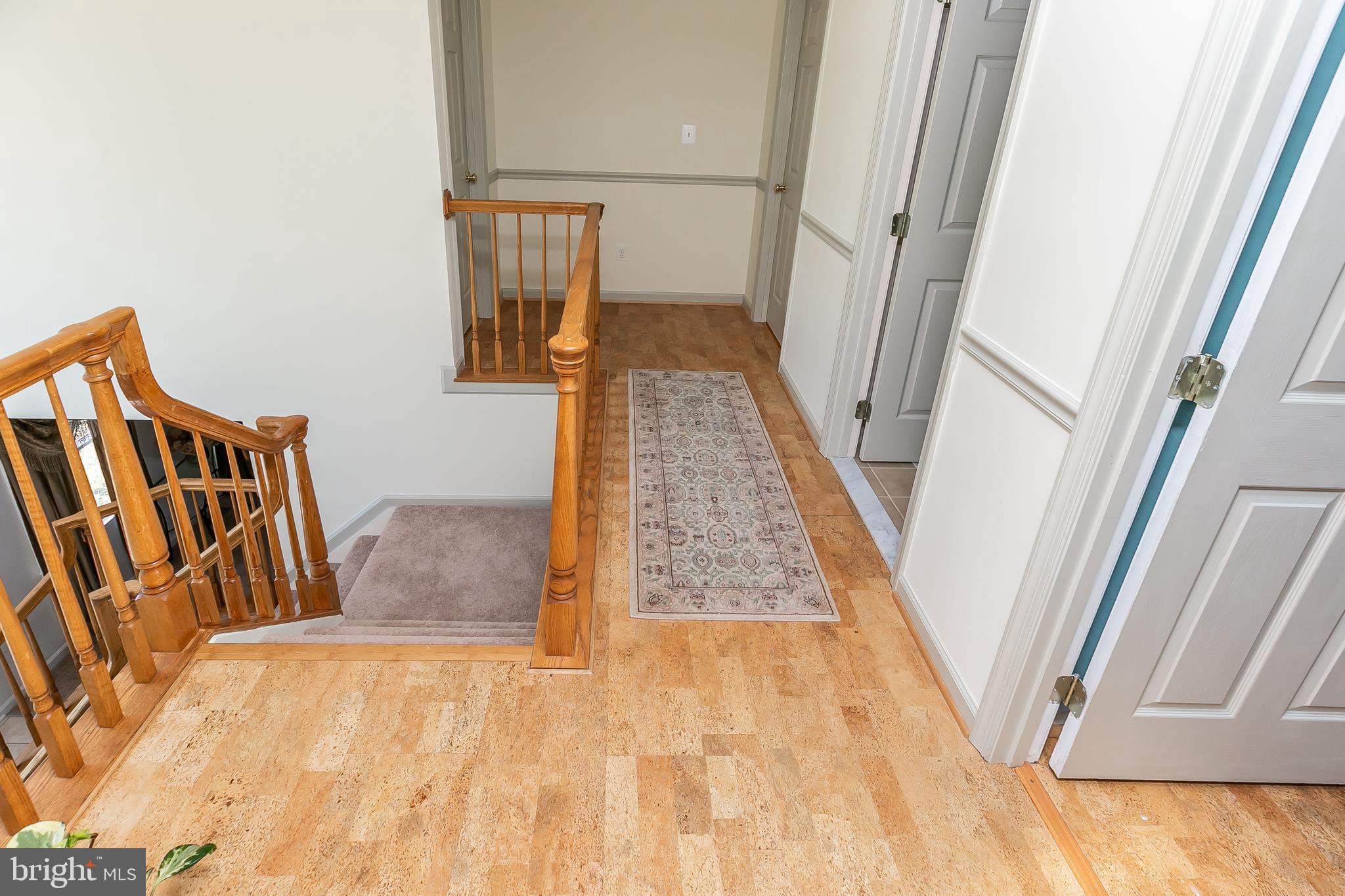 9843 Magledt Road Baltimore, MD 21234 - Photo 26 of 41 Upper Level Hallway with Cork Floors