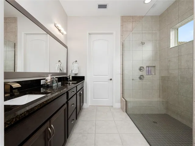 a kitchen with a sink and a stove
