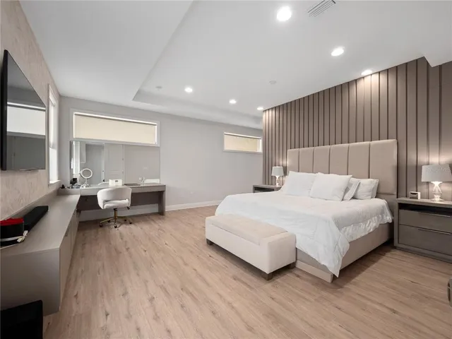 a bed room with a bed and a couch