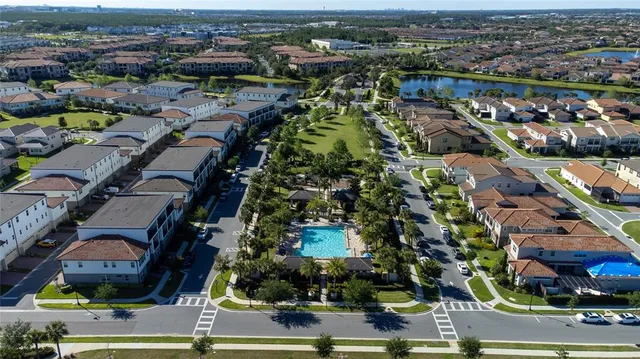 an aerial view of a city with lots of residential buildings