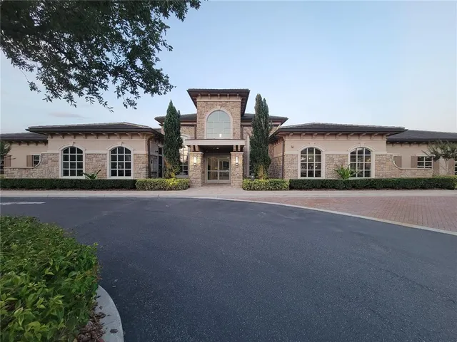 a room with gym equipment and view of living room