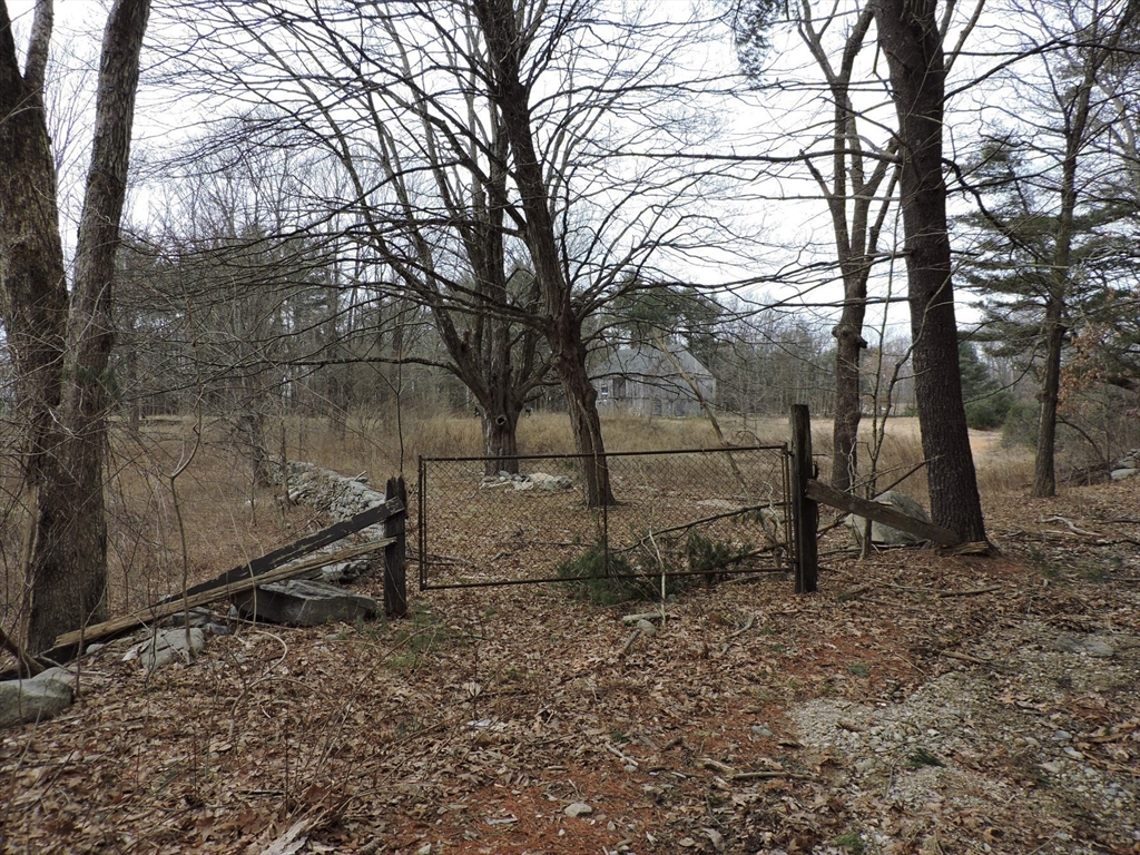 179 Upper Gore Road Webster, MA 01570 - Photo 13 of 42 a backyard of a house with lots of green space