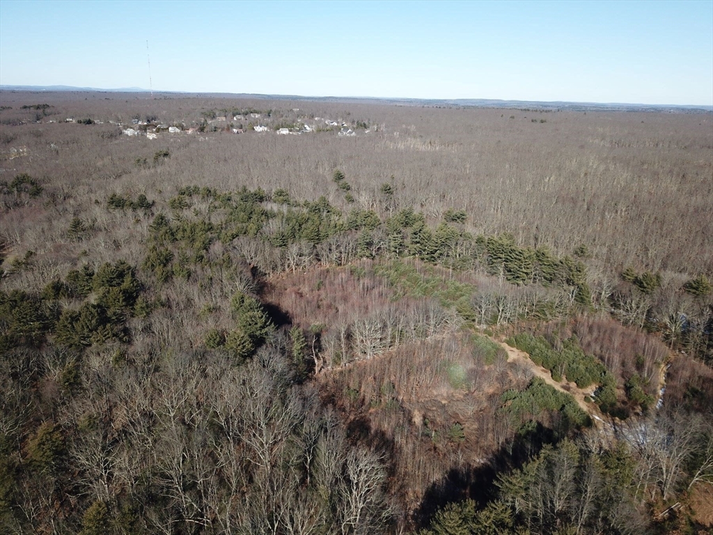 179 Upper Gore Road Webster, MA 01570 - Photo 25 of 42 an aerial view of house with yard and mountain in the back