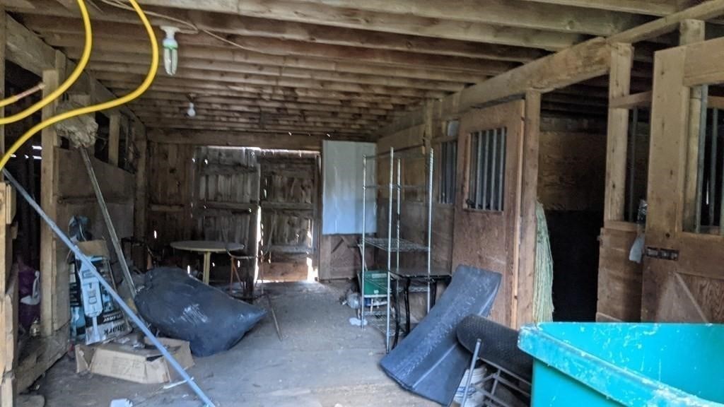 179 Upper Gore Road Webster, MA 01570 - Photo 39 of 42 a view of outdoor living space with wooden floor and windows