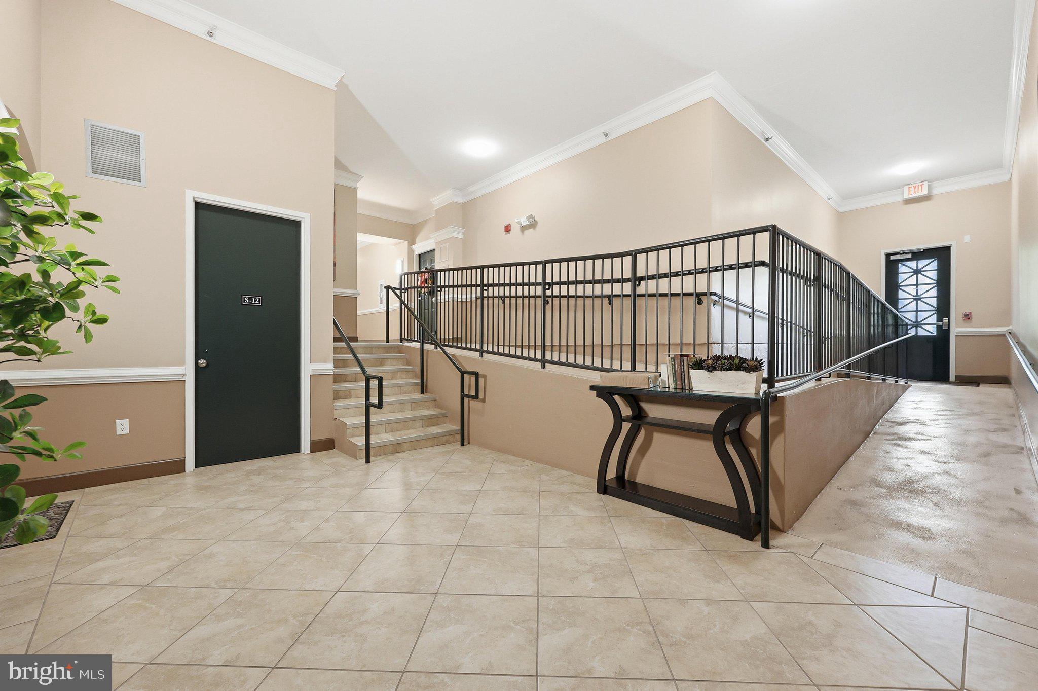 7 Booth Street, Unit 110 Gaithersburg, MD 20878 - Photo 49 of 50 Additional entrance to the building with ramp.