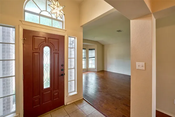a view of an empty room and window