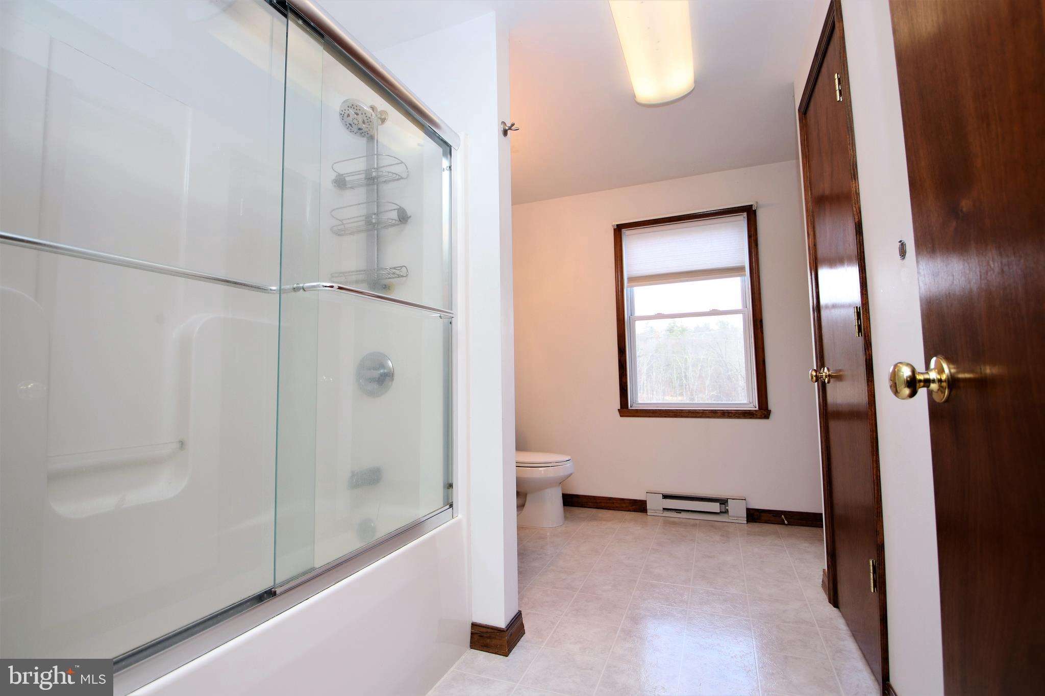 639 Packing House Road Berkeley Springs, WV 25411 - Photo 23 of 34 Upper Level Full Bath