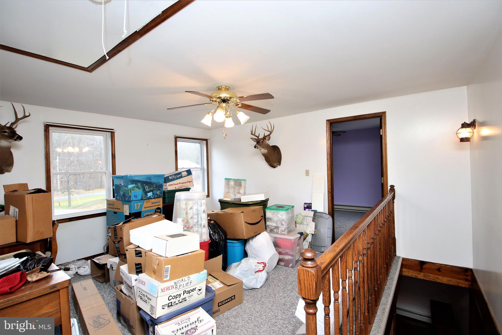 639 Packing House Road Berkeley Springs, WV 25411 - Photo 25 of 34 Upper Level Family Room