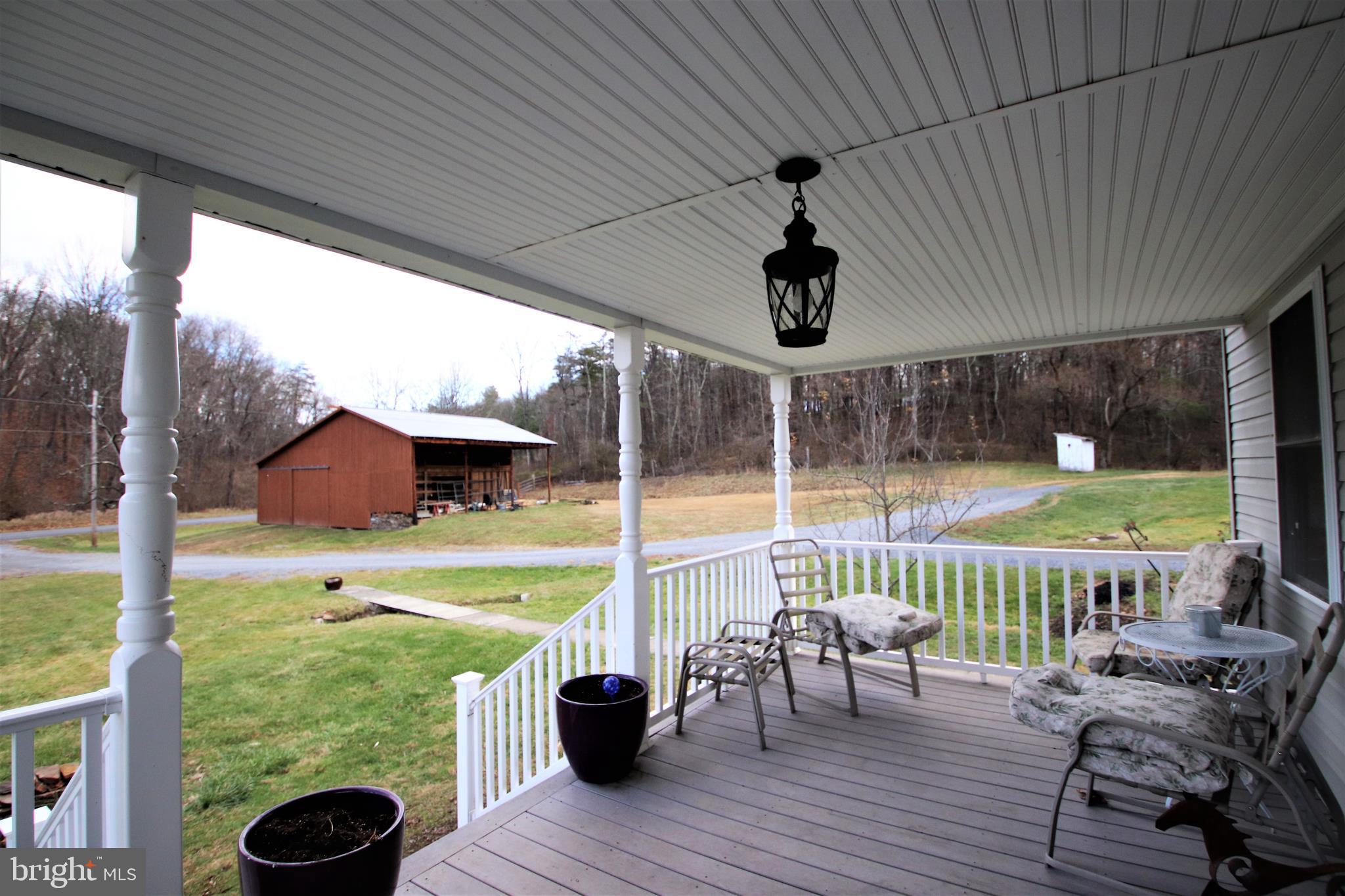 639 Packing House Road Berkeley Springs, WV 25411 - Photo 4 of 34 Large covered Front Porch