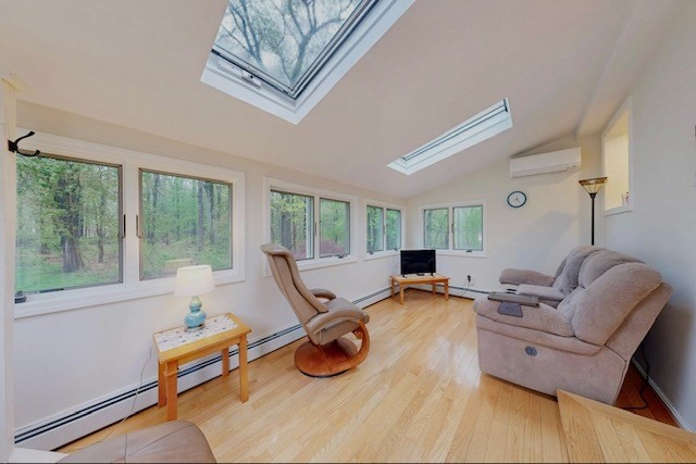2 Russett Road Bedford, MA 01730 - Photo 13 of 41 a living room with furniture and a large window