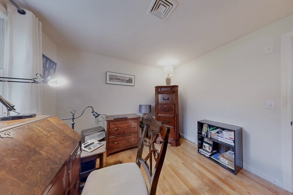 2 Russett Road Bedford, MA 01730 - Photo 14 of 41 a workspace with furniture and wooden floor