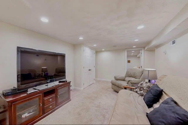 2 Russett Road Bedford, MA 01730 - Photo 25 of 41 a living room with furniture and a flat screen tv