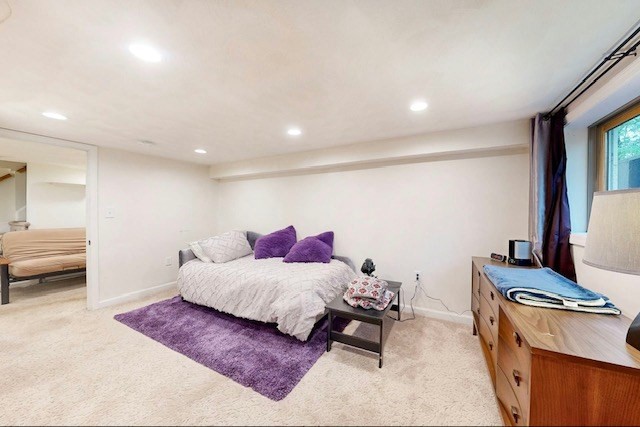 2 Russett Road Bedford, MA 01730 - Photo 27 of 41 a bedroom with a bed and a dresser with mirror