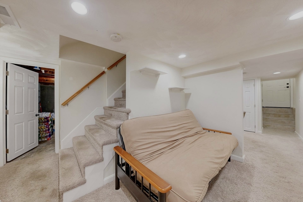 2 Russett Road Bedford, MA 01730 - Photo 33 of 41 a bedroom with a bed and a view of hallway