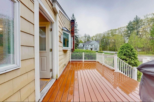 2 Russett Road Bedford, MA 01730 - Photo 37 of 41 a view of a balcony with wooden floor and fence
