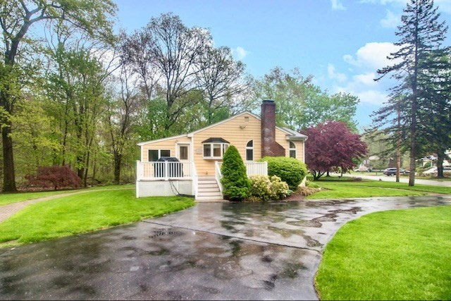 2 Russett Road Bedford, MA 01730 - Photo 39 of 41 a view of a house with yard and a garden
