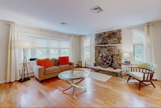 2 Russett Road Bedford, MA 01730 - Photo 6 of 41 a living room with furniture and a large window