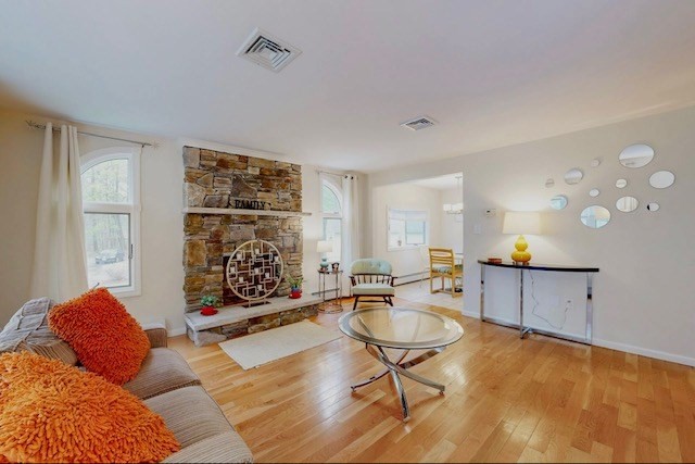 2 Russett Road Bedford, MA 01730 - Photo 7 of 41 a living room with furniture a rug and a window