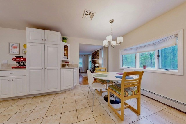 2 Russett Road Bedford, MA 01730 - Photo 8 of 41 a view of a dining room with furniture window and outside view
