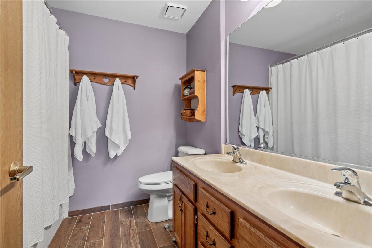 2110 Peach Tree Lane, Unit 2110 Algonquin, IL 60102 - Photo 15 of 21 a bathroom with a sink and a mirror