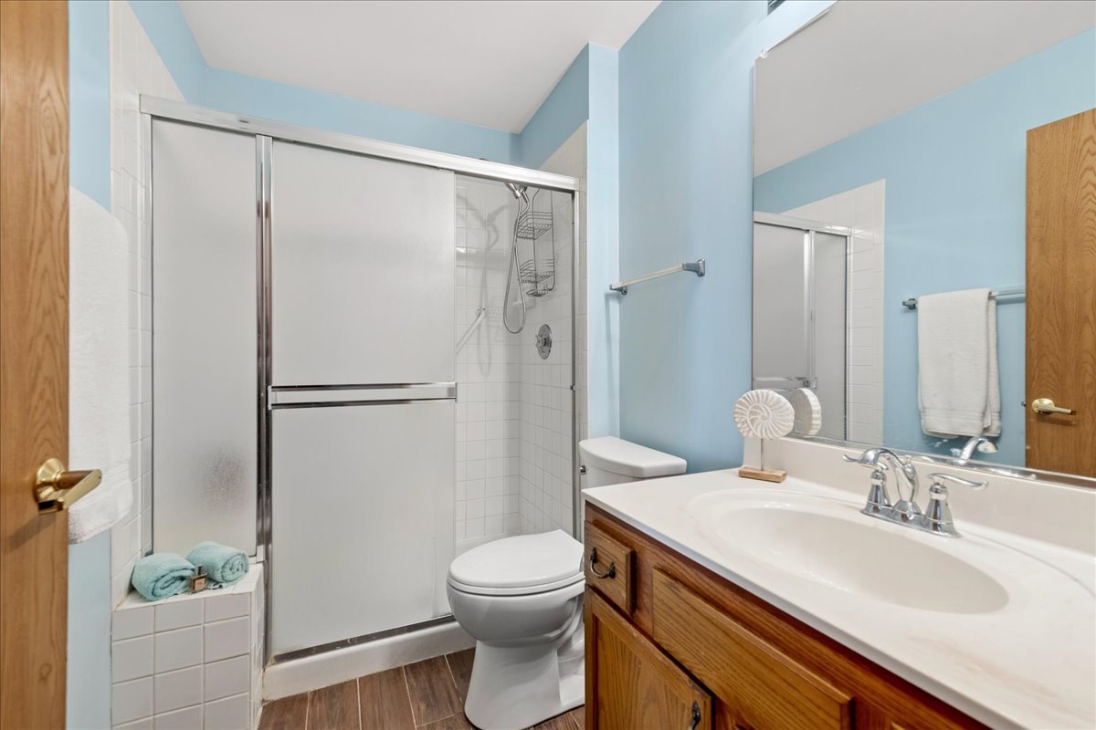 2110 Peach Tree Lane, Unit 2110 Algonquin, IL 60102 - Photo 17 of 21 a bathroom with a granite countertop sink toilet and shower