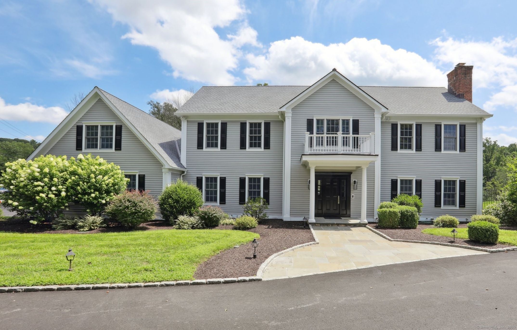 710 Redding Road Redding, CT 06896 - Photo 1 of 1 a front view of a house with a yard and garage