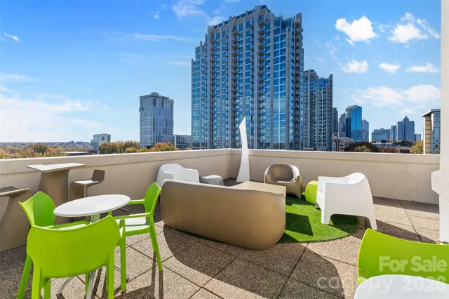 a view of a street with a building in the background
