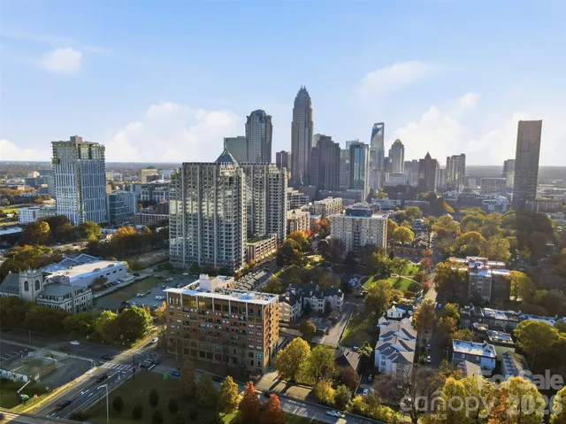 a view of a city with tall buildings