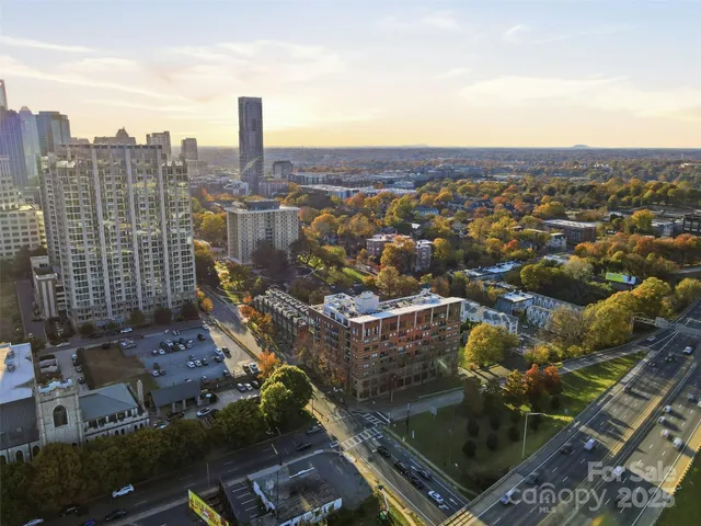 a view of a city with tall buildings