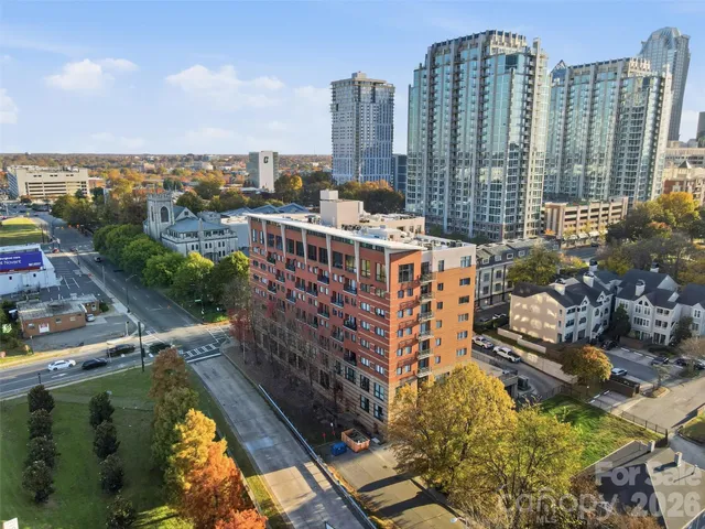 a view of a balcony with two chairs