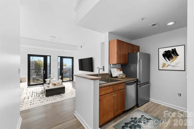 a work place with furniture and flat screen tv