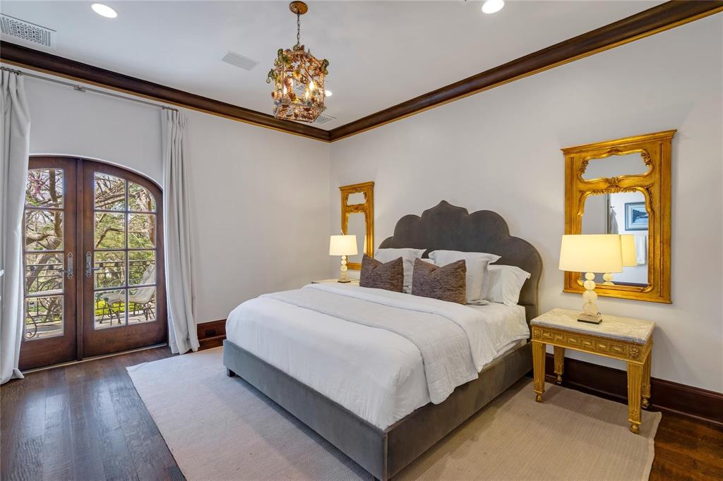 4612 Watauga Road Dallas, TX 75209 - Photo 31 of 32 This room features rich hardwood flooring and arched french doors that open to exterior views